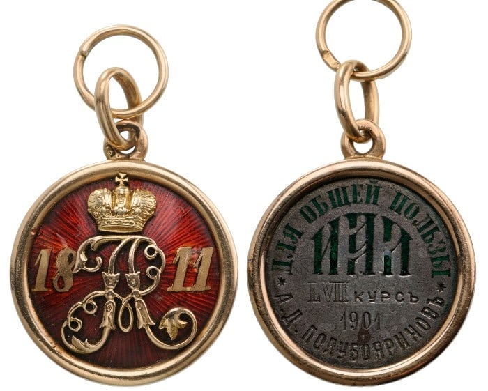 Honour Jetton of the Imperial Aleksandr School: Red enameled, 24 mm, GOLD medallionÂ with the year â??1811â?? and superimposed with the ornate, crowned monogram â??Aâ?? , enclosed within a golden border with suspension loop struck with Gold ma