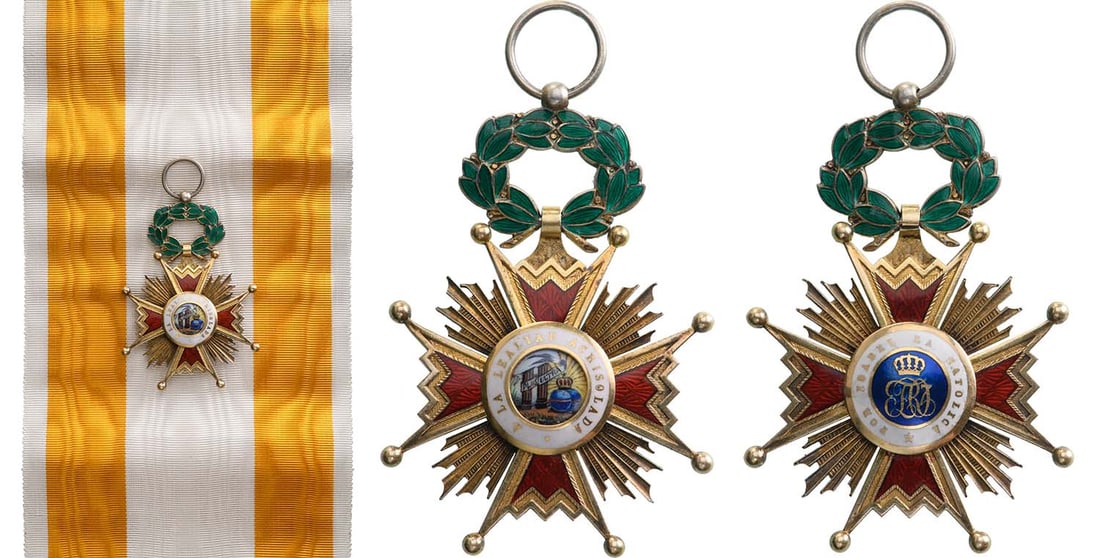 ORDER OF ISABELLA THE CATHOLIC: Grand Cross Badge. Sash Badge, gilt Silver, 63x42 mm, red enameled arms, obverse centre medallion with enameled details, within white enameled outer circlet with the Order's motto in gold lettering, d