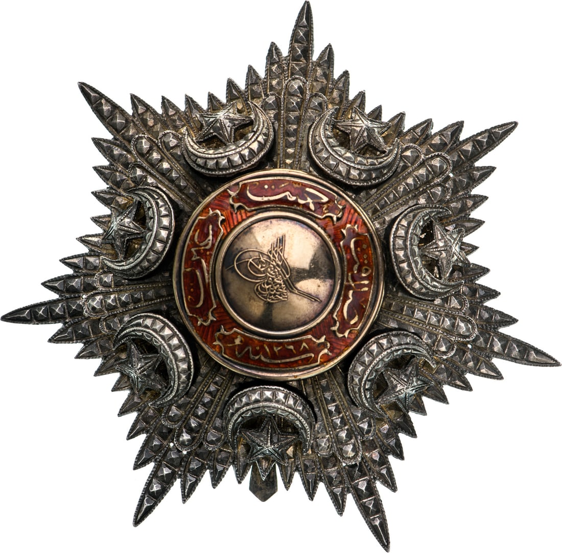 Order of Mecidi: Grand Officer's Star, 2nd Class, Crimean Period. Breast Star, 82 mm., Silver, Turkish hallmarked, in chiseled and pierced silver with gold centre medallion also with the Sultan`s Tughra, with red enam