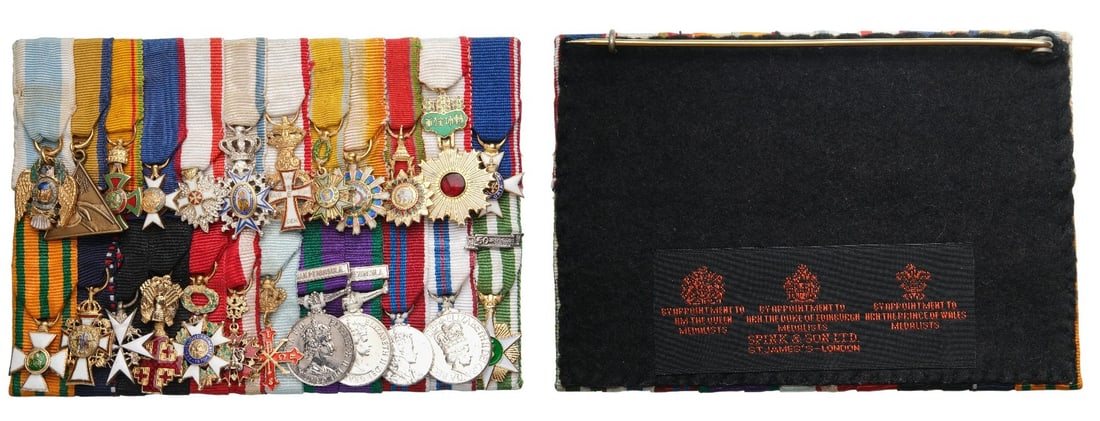 Diplomatic Bar of 24: A fantastic Miniatures Barr of 24, various sizes and metals. USA - Order of Cincinatti; USA - Mule of the Bear Medal, 1st division of Cavalry; Ethiopia - Order of Menelik; Haiti - National Order of Ho