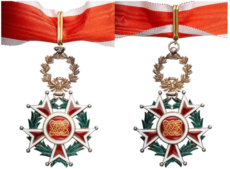 Order of the Brilliant Star of Zanzibar (Wisam al-Kawkab al-Durri al-Zanzibari): Commander's Cross, 3rd Class, instituted in 1865. Neck Badge, 91x60 mm, gilt Silver, with red enameled arms (some restorations to points), suspension wreath, ring, loop and original short neck ribbon.