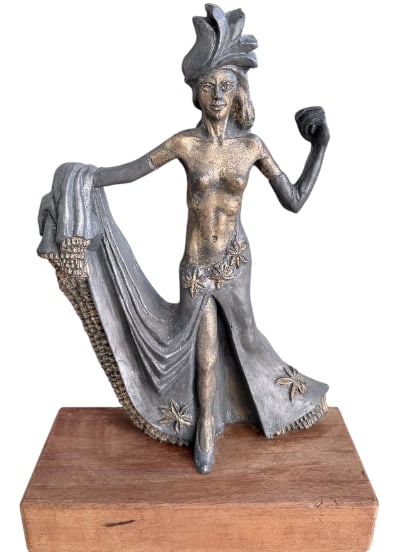 Bronze Statuette depicting a Music-Hall Dancer: Large patinated bronze statuette depicting a music-hall dancer, the free-spirited figure bare-breasted, wearing a feathered headdress, her waist cinched with a large embroidered fabric, heeled shoes a