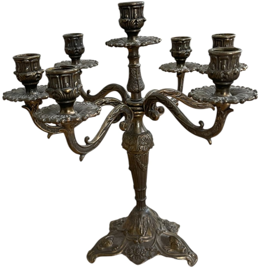 Art Nouveau Candlestick: Seven-armed Art Nouveau candlestick in brass, beautiful decoration, moving arms, in superb condition and beautiful dark patina. Dim.: 31 cm (height), circa 30 cm (diameter between the arms).