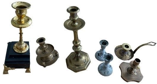 Candlestick Set of 7: Beautiful set of candlesticks in various metals composed of seven mismatched elements: 1. large candlestick with modern golden trim for modern fireplace base on marble with small feet, 2. bedside cand