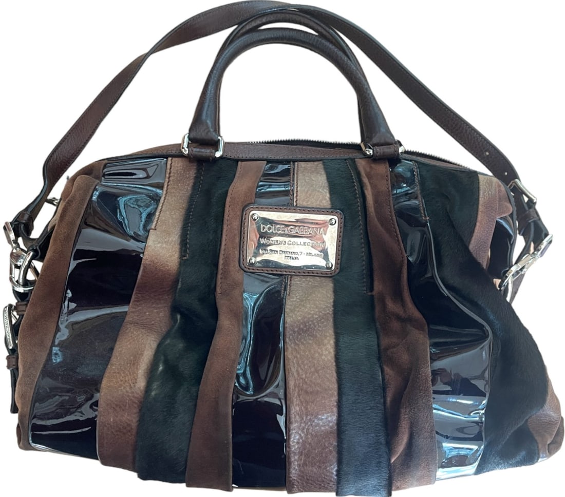 Dolce & Gabbana Miss Urbanette Brown Leather Bag: Double handled bag with shoulder strap and brown leather, patent leather, pony hair, and suede striped body in very good condition. Dim.: 43x28x24 cm