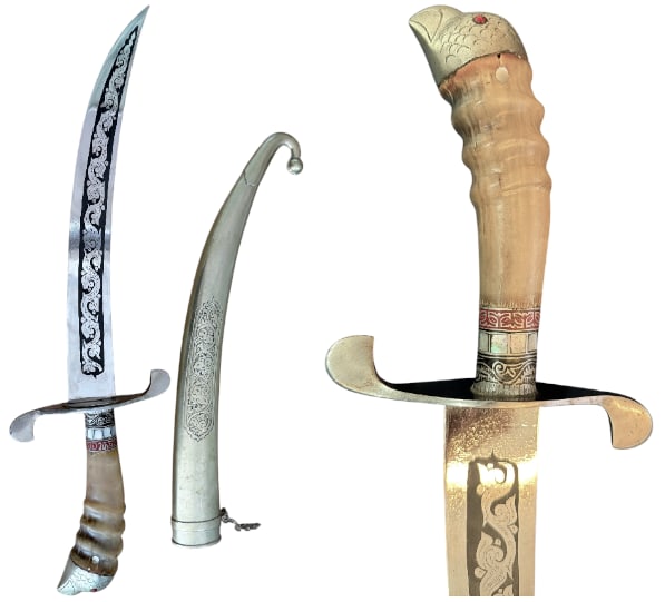 Oriental-Style Dagger: A short, oriental-style dagger with a curved blade decorated with a scroll-like frieze engraving, "Marengo-style" quillons, a ferrale inlaid with mother-of-pearl and motifs, and a bone hilt ending in 