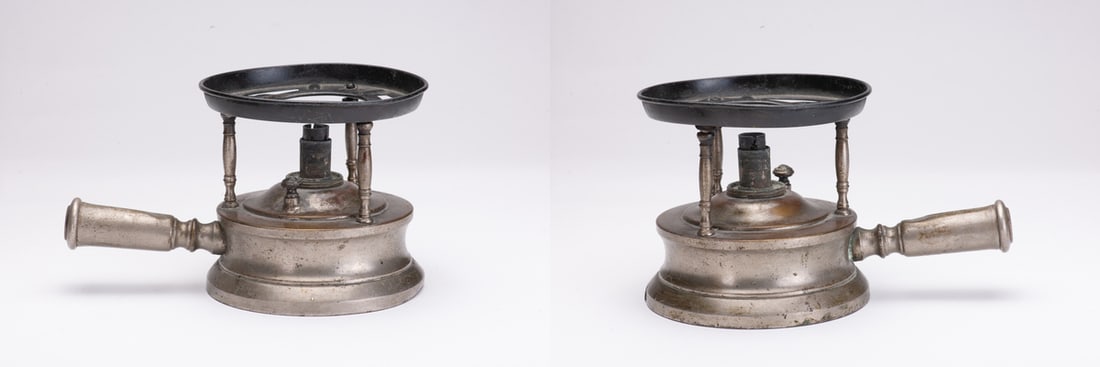 Metal alcohol stove: Metal alcohol stove (probably for military use), side handle, combustion grate. Complete and in working order. Height 12 cm