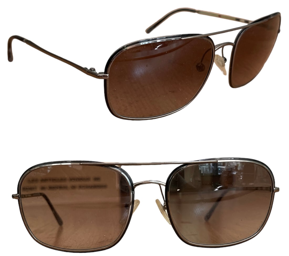 Pair of Burberry Men`s Sunglasses: Pair of Burberry men`s sunglasses. Comes with Revo etui and cloth. Good condition.