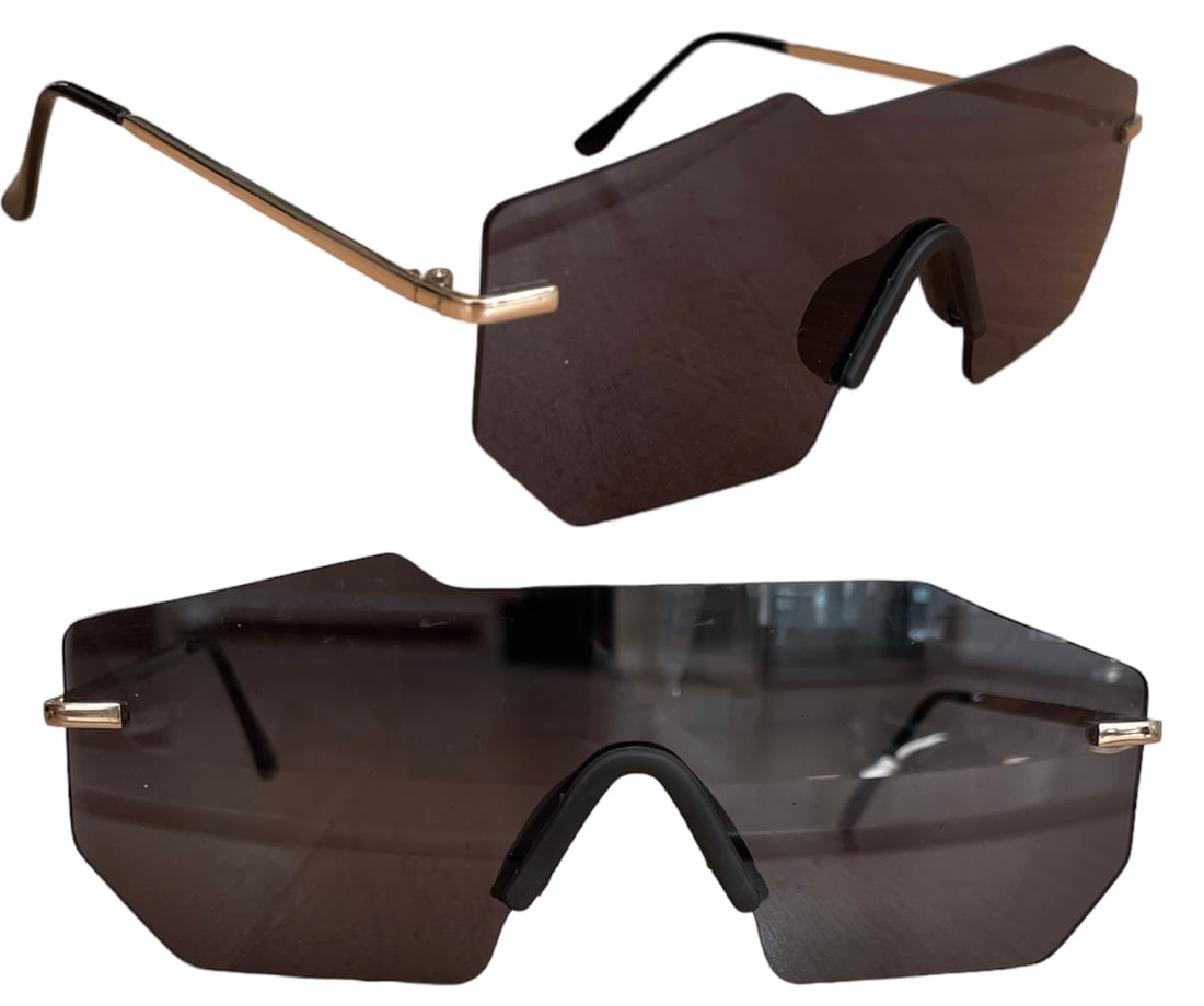 Pair of LMNT Copenhagen Unisex Sunglasses: Pair of LMNT Copenhagen unisex sunglasses. Comes with etui and cloth. In perfect condition.