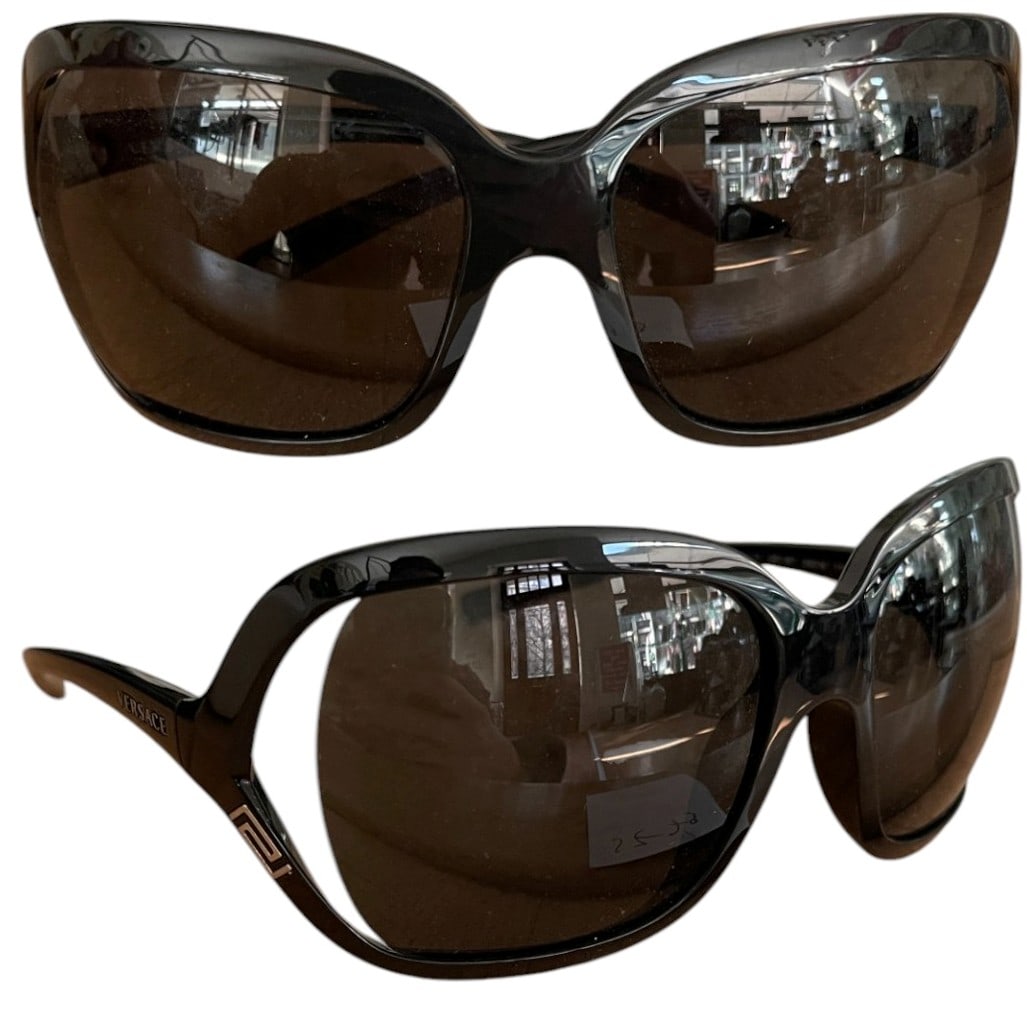 Pair of Versace MOD 4114 Black Womens Sunglasses: Pair of Versace MOD 4114 black womens sunglasses in original case and cloth. Very good confition.