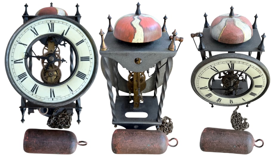 Skeleton Clock Movement: Antique skeleton clock movement with steel wheels and counterweights resting on a base with glides, large white enamel dial, Roman numerals, cupola-shaped dome framed by small pinnacles, Baroque