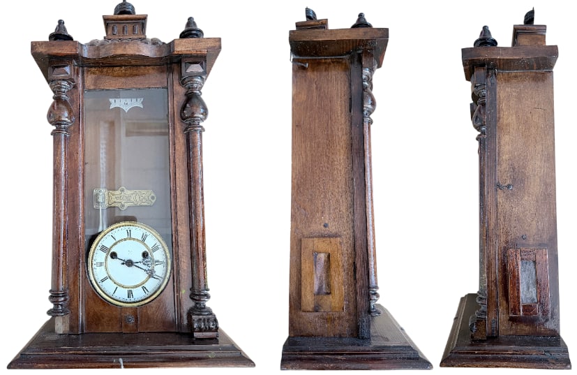 Classic Cartel Clock: Large, classic cartel clock with an architecturally designed wooden frame in a glass case, featuring a columned design, a molded pediment framed by urns, a white enamel dial with two rows of gilt