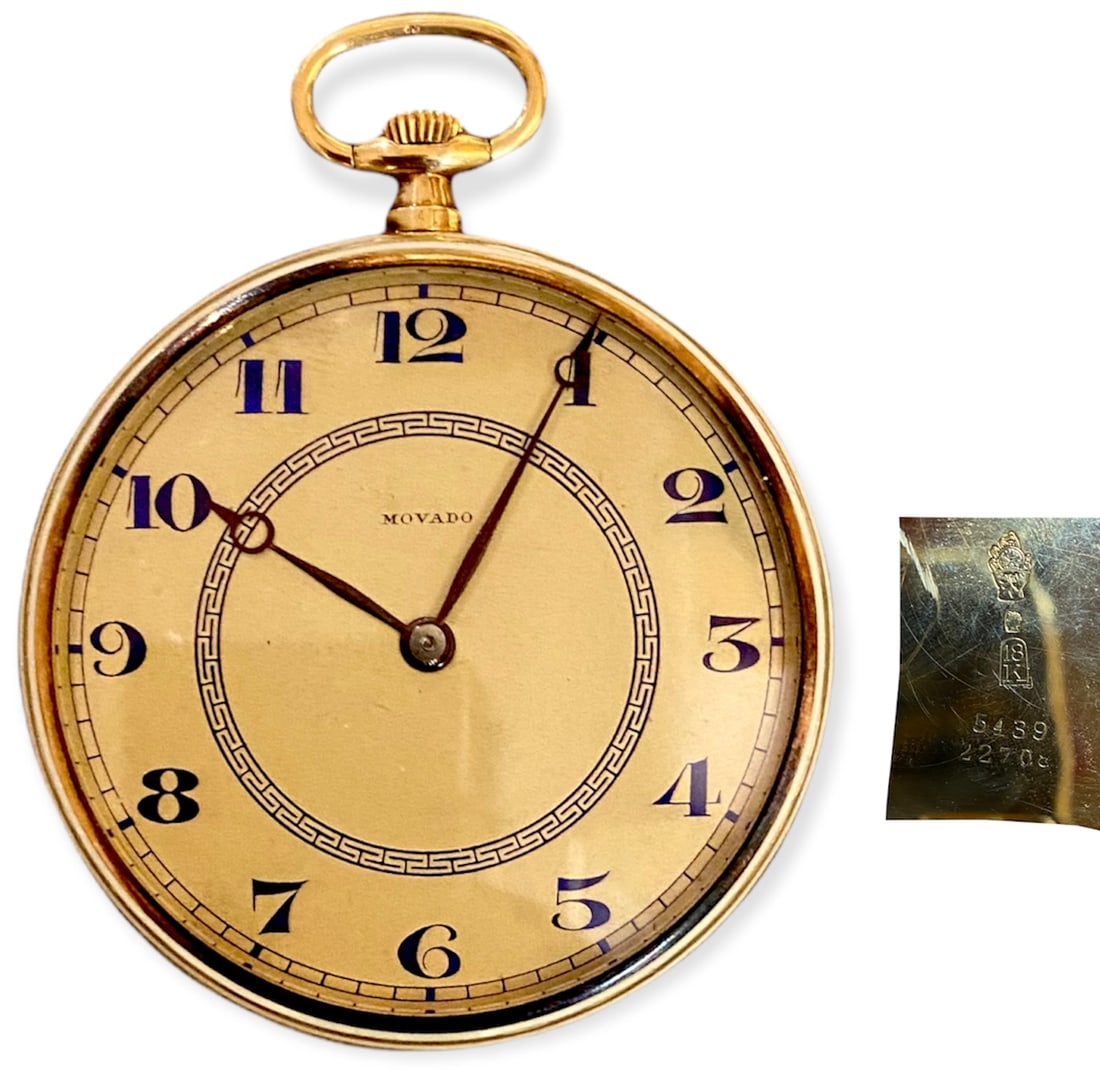 Gold Movado 18k Ladies Pocket Watch: Gold Movado 18k ladies pocket watch, Art Deco style, mechanical mouvement, winder and chain ring, enameled on the back (cracked), hallmarked "18k-Helvetia head- hand holding watch". Diamenter 46 mm, g