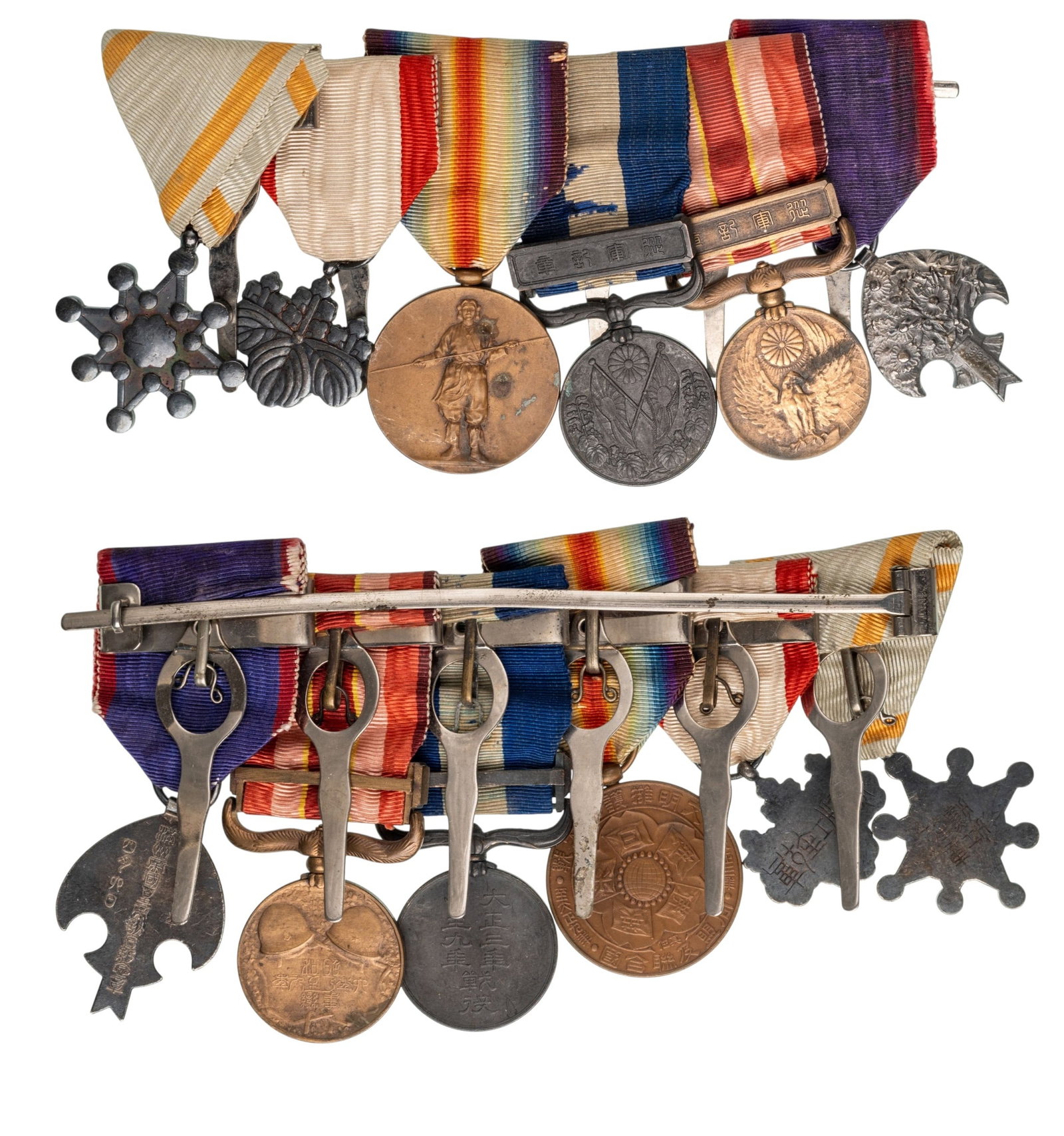 THE COLLECTION OF ORDERS AND MEDALS BARS - Bar of 6: Order of the Sacred Treasure (Kunnito Zuihisho), 8th Class, Silver; Order of the Rising Sun (Kyokujitsusho), 8th Class, Silver; Victory Medal, Bronze, Rare!; Siberia Intervention Medal, Bronze; Mancho