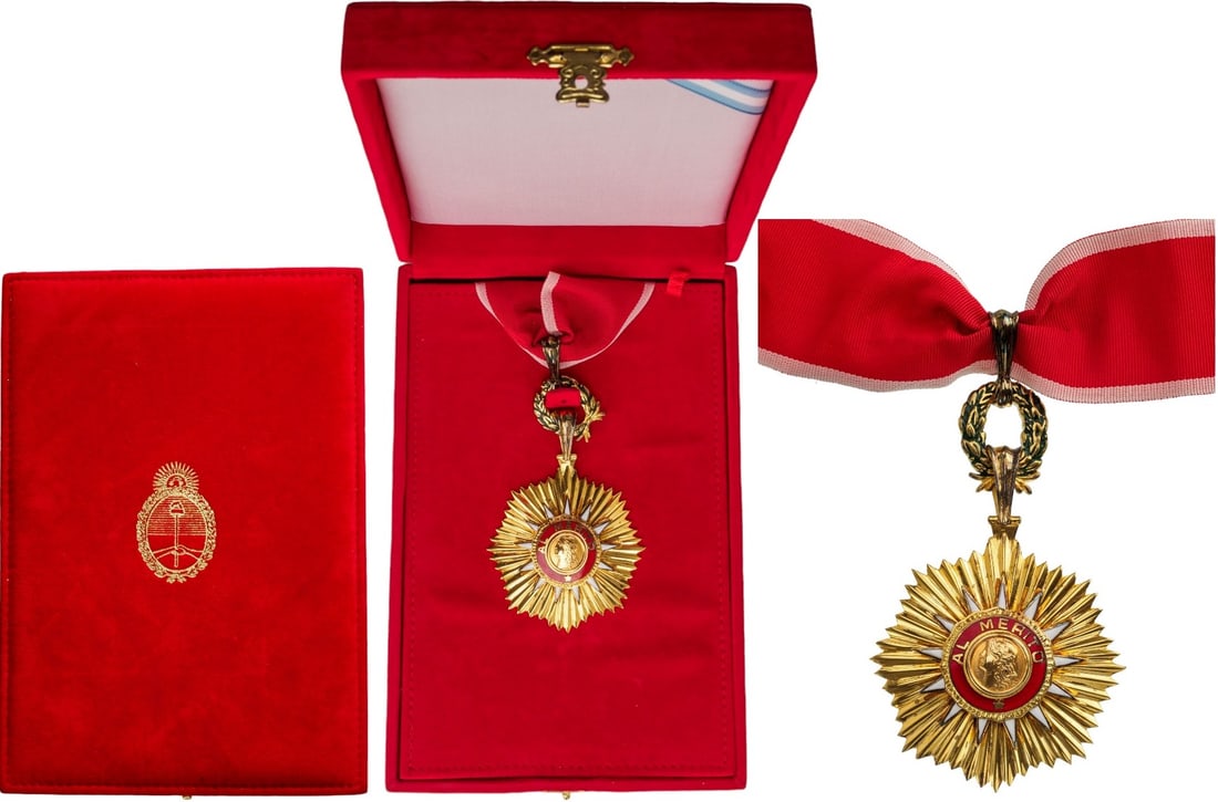 ORDER OF MAY: Commander`s Cross, 3rd Class, institued in 1957. Neck Badge, 101x62 mm, gilt Silver, central medallion gilt, enameled, original suspension loop and complete neck ribbon, in original velevt case of iss