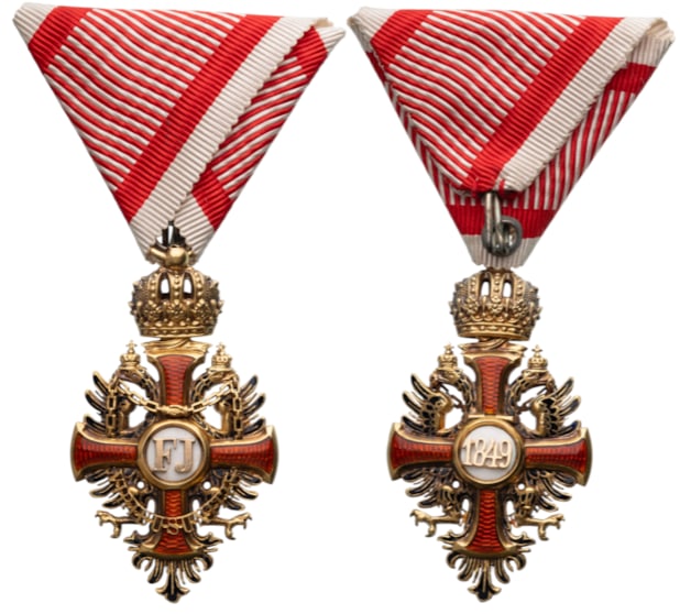 The Imperial Order of Franz Joseph: Knight's Cross, instituted in 1849. Breast Badge, 55x31 mm., GOLD., maker's mark " GEBR. RESCH", enameled, original suspension ring, loop and triangular ribbon. Mint condition! I