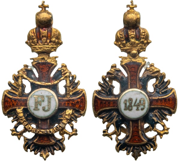The Imperial Order of Franz Joseph: Knight's Cross Mniature, instituted in 1849. Breast Badge, 12x7 mm., GOLD. Extremely fine condition! I-