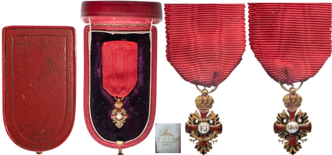 The Imperial Order of Franz Joseph: Knight's Cross Mniature, instituted in 1849. Breast Badge, 18x9 mm., GOLD, original ring and ribbon in case of issue by "Mayer's & Sohne - Wien". Extremely fine condition and superb jeweller's work! I