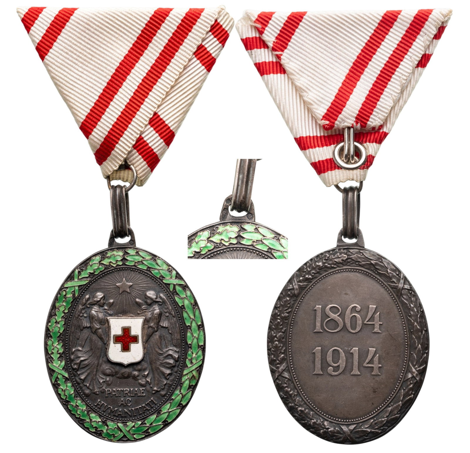 Red Cross Merit Medal with War Decoration: Bronze Class, instituted in 1864. Breast Badge, 51x37 mm., Bronze, enameled, original suspension ring and triangular ribbon. Extremely fine! I