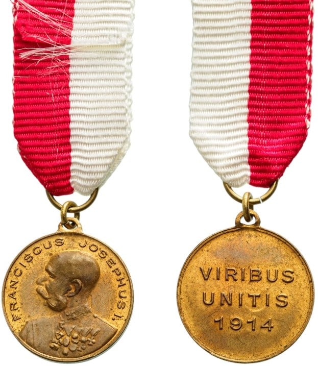Souvenir Medal of Franz Joseph, 1914: Breast Badge, 15 mm., Bronze, original suspension ring and ribbon. Mint condition! I