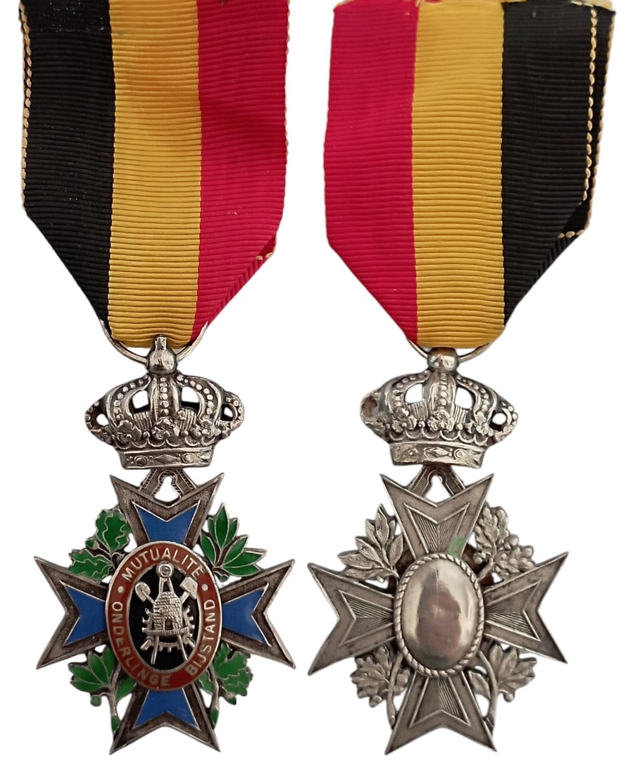 Silver Medal for Mutual Aid Societies: 2nd Class. Breast Badge, 53x27 mm, Silver, one side enameled, original suspension crown, ring and ribbon. A beautiful cross in extremely fine condition! I