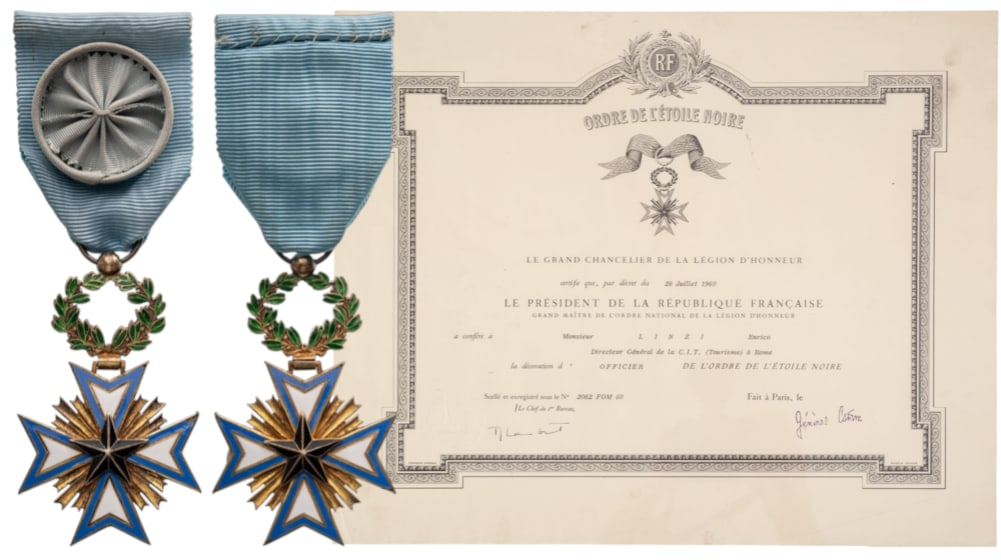 Order of the Black Star: Officer's Cross, instituted in 1889. Breast Badge, 60x38 mm,, gilt Silver, both sides enameled, original suspension ring and ribbon with rosette, together with awarding document to the C.E.O. of the C