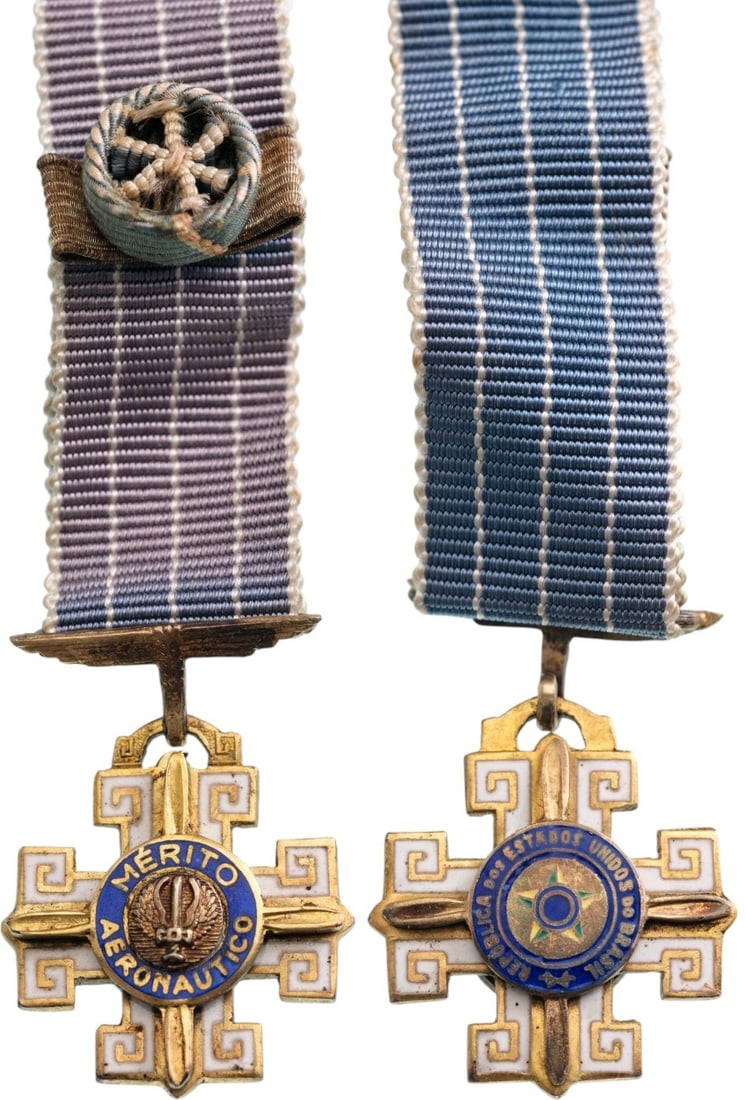 ORDER OF AERONAUTICAL MERIT: Commander's Cross Miniature, 4th Class, instituted in 1943. Breast Badge, 26x18 mm, gilt Silver, both sides enameled, both central medallions gilt Silver, enameled, original suspension eagle and ribbo