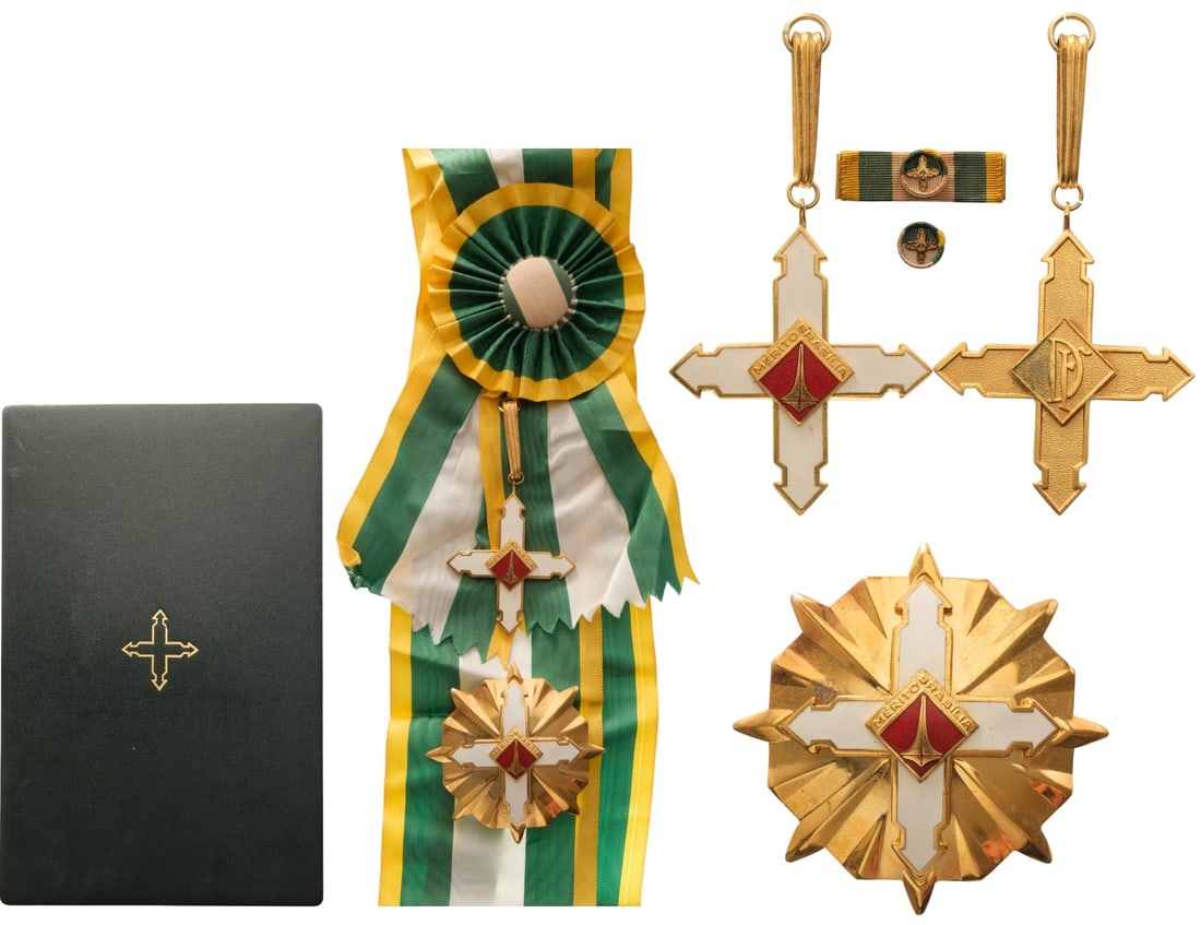 Order of State Merit: Grand Cross Set, 1st Class. Sash Badge, 67x55 mm, gilt Bronze, one-side enameled, both central medallions gilt and inscription on reverse, original suspension loop and complete sash. Breast Star, 75 m