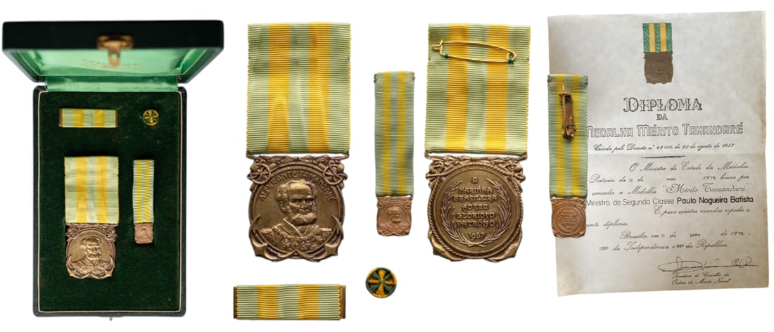Medal of Merit of Tamandare: Breast Badge, 40x35 mm, gilt Bronze, original suspension ring and ribbon, in case of issue by "Condal - Rio" with miniature, lapel hole rosette and bar, awarded to a Brazilian Minister in 1976. I