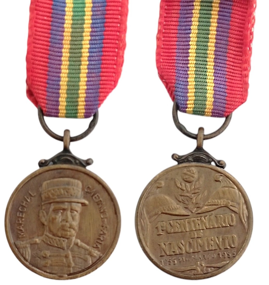 Centenary Medal of Marshall Caetano de Faria, 1955: Breast Badge Miniature, 21x16 mm, Bronze, original suspension ring and ribbon. Scarce and attractive medal, in mint condition! I R!