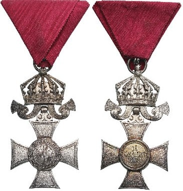 Order of Saint Alexander: 6th Class with Crown Civil, instituted in 1882. Breast Badge, 68x36 mm, silvered, original suspension ring and triangular ribbon. A badge of very fine quality, and extremely fine condition! I
