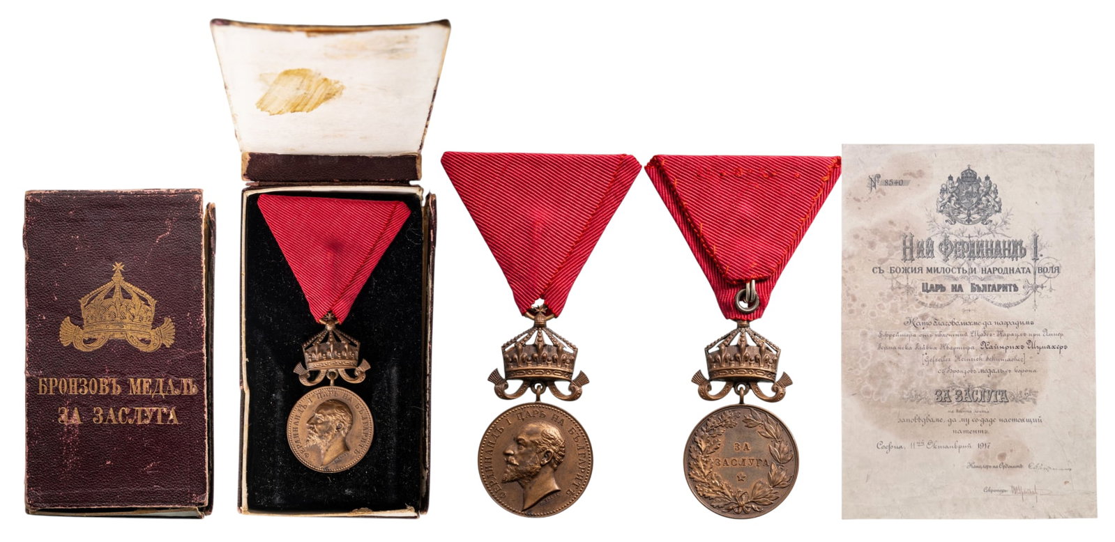 Medal for Merit, King Ferdinand with Crown: 3rd Class 5th Type, with Crown. Breast Badge, 50x27 mm, Bronze original suspension crown, ring and ribbon, in damaged case of issue, with gilt inprint on the lid, together with awarding document to a 