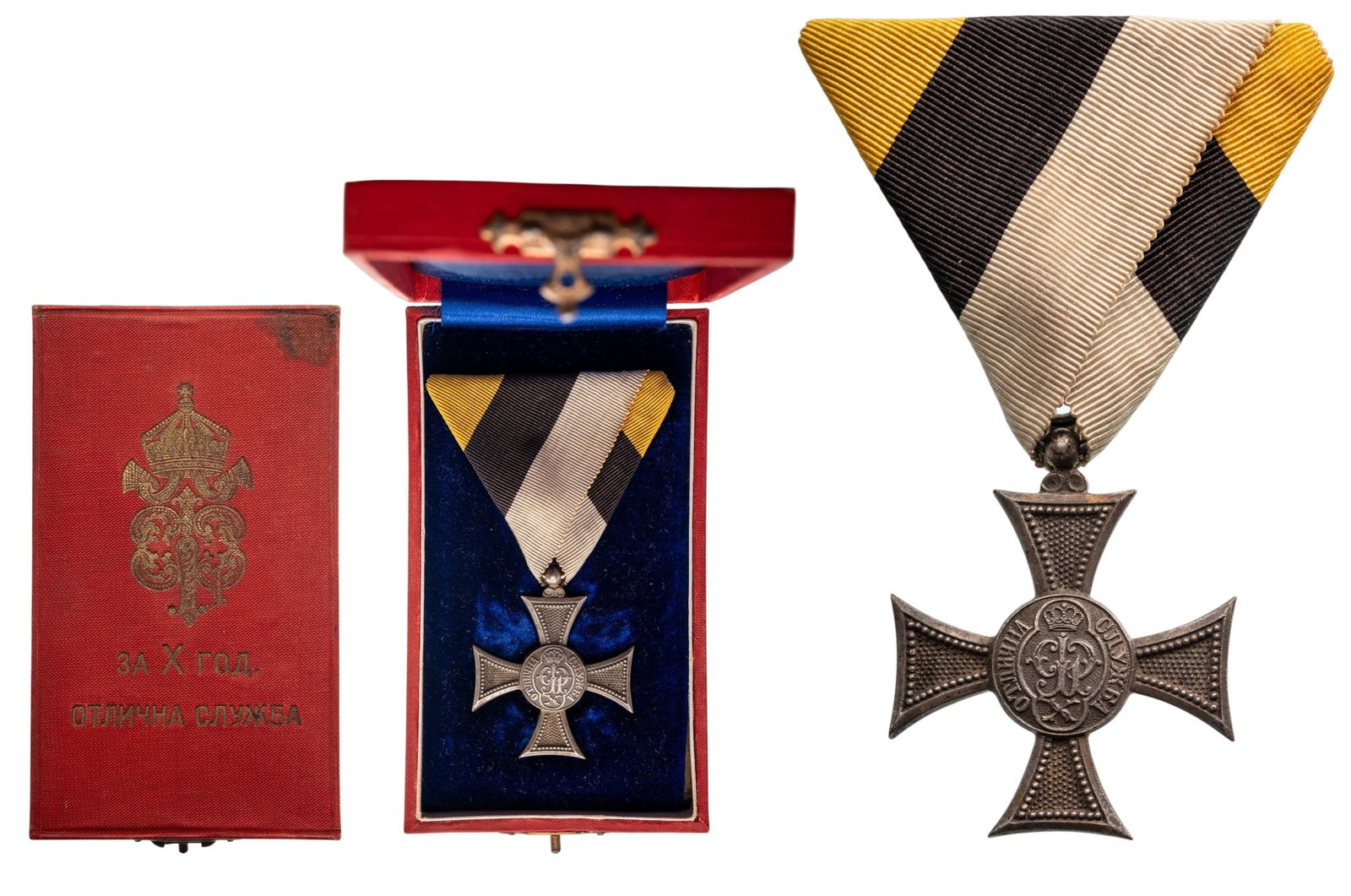 CROSS FOR X YEARS OF FAITHFUL SERVICE (OFFICERS), FERDINAND ISSUE: Breast Badge, 40x33 mm, Silver, original suspension ring and ribbon, in superb case of issue with gilt monogram of King Ferdinand I and inscription on the lid. A superb, rare badge in extremely fine c