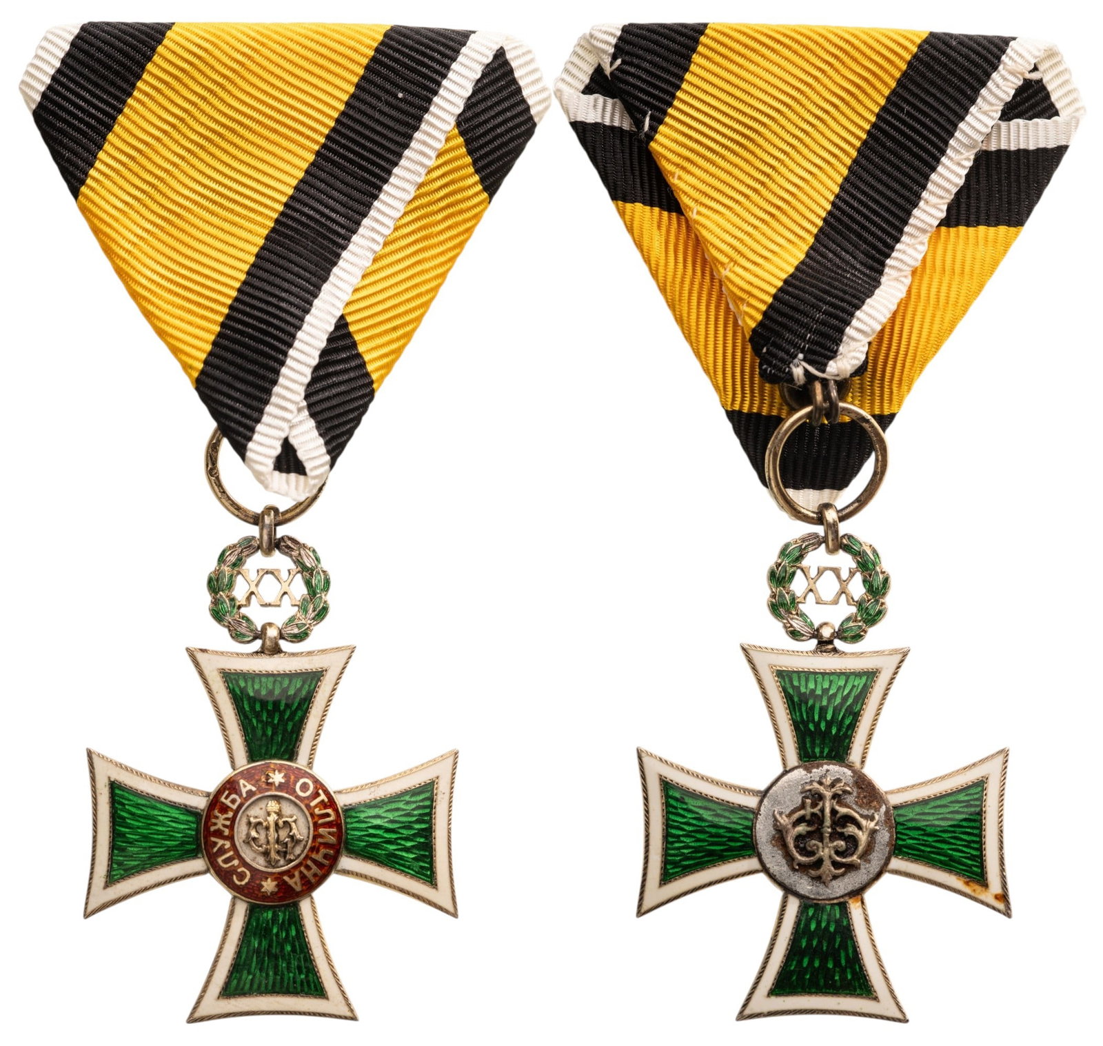 Cross for XX Years of Faithful Service for Officers, Tsar Ferdinand I issue: Breast Badge, 48x35 mm., gilt Silver, enameled (reverse center missing), original suspension ring and triangular ribbon. Very fine condition! IV