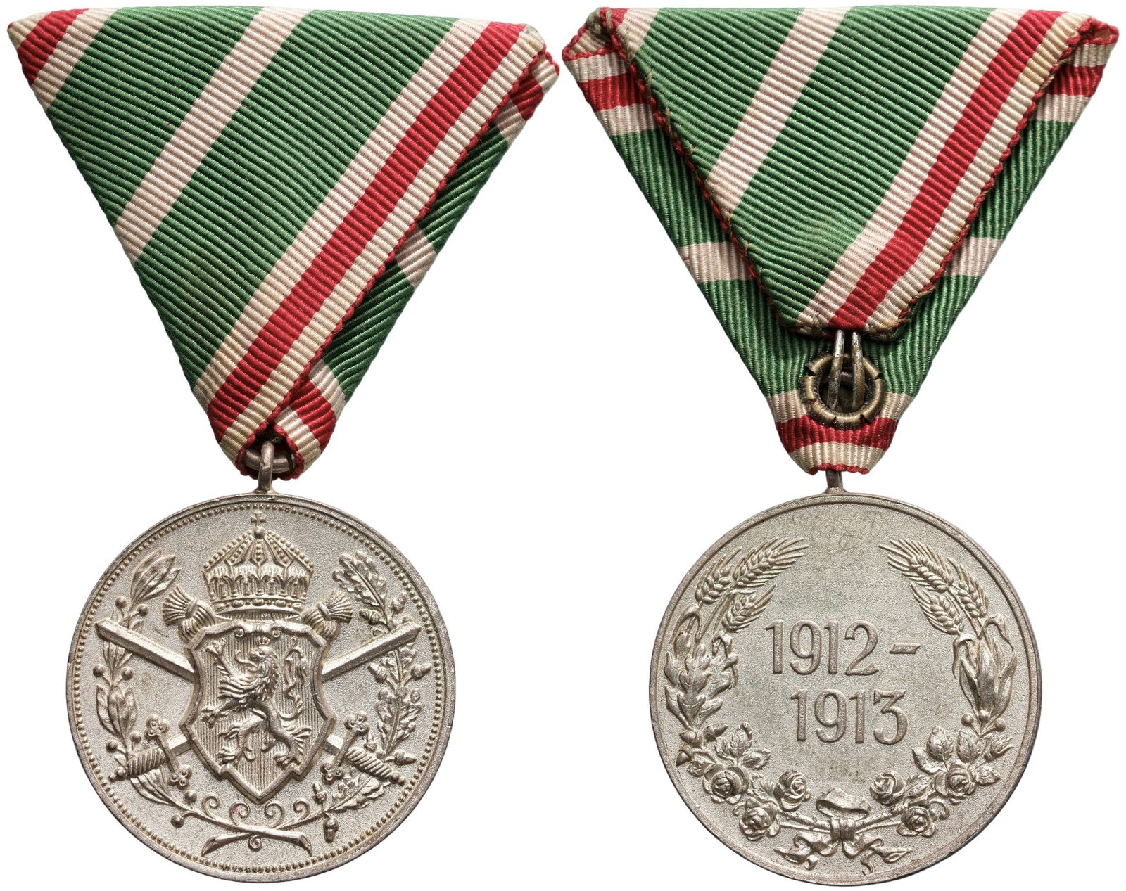 Commemorative Medal for Participation in the Balkan Wars of 1912-1913, for non-combatants: Breast Badge, 37x32 mm., silvered, original suspension ring and triangular ribbon. Mint condition! I