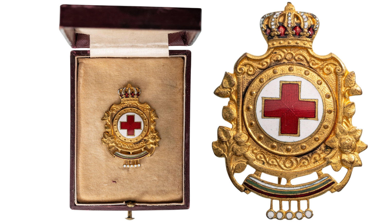 ROYAL BADGE OF MERIT OF THE RED CROSS, KING BORIS III, 3RD EMISSION: Breast Badge, 41x29 mm., gilt Bronze, enameled, original vertical thin pin on reverse, in elegant leather case of issue. Extremely fine condition! I