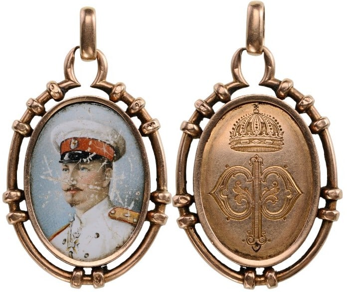 Miniature Portrait of Prince Ferdinand of Bulgaria: Painted Medallion, 32 x 24 mm., GOLD, with the young Prince wearing the white army field uniform of a General, enclosed in a double, golden oval frame with stylized â??knotsâ??, the reverse, with ov