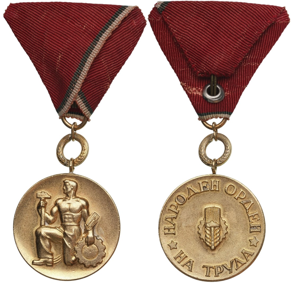 Order of People,s Labor, 1st Class, 1st Emission with Wreath: Breast Badge, 46x33 mm., gilt Bronze, original suspension ring and ribbon. Mint condition and scarce! I R!