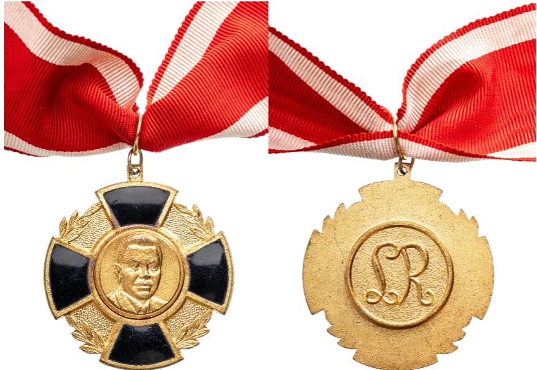 ROYAL ORDER OF PRINCE LOUIS RWAGASORE: Knight`s Cross. Breast Badge, gilt Bronze, 40 mm, one side enameled, central medallion gilt Bronze, original suspension loop and ribbon. Perfect condition! I
