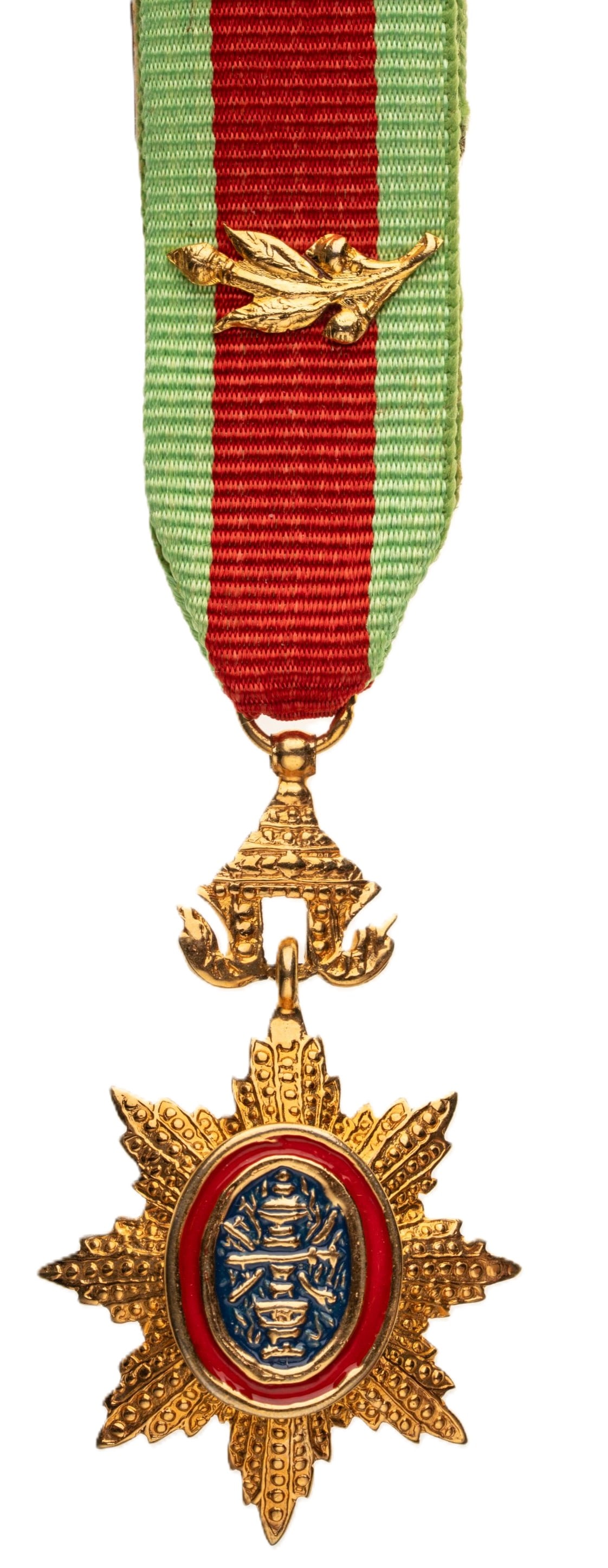 ROYAL ORDER OF CAMBODIA: Officer's Cross Half Size, 4th Class, instituted in 1886. Breast Badge, 49x29 mm., gilt Bronze, central medallion enameled, original suspension crown, ring and ribbon witl palm. An extremely fine badg
