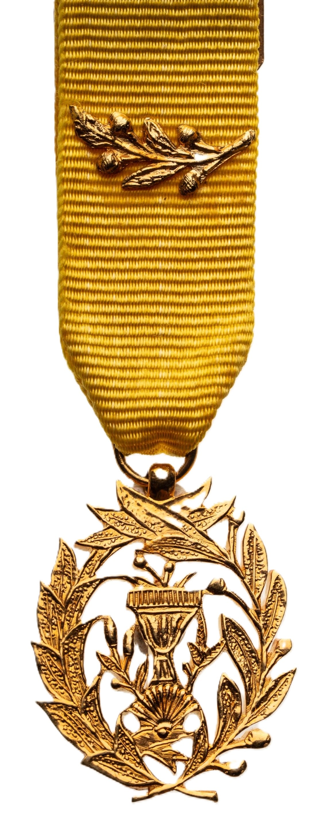 Order of Muniseraphon: Officer's Cross Half Size, 4th Class, instituted in 1886. Breast Badge, 31x25 mm., gilt Bronze, original suspension ring and ribbon witl palm. An extremely fine badge, of very unusual manufacture, in 