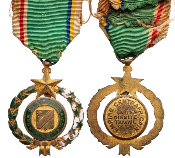 Order of Agricultural Merit: Knight's Cross, instituted in 1962. Breast Badge, 51x40 mm., gilt Bronze, one side enameled, original suspension ring and ribbon. Very fine condition! II