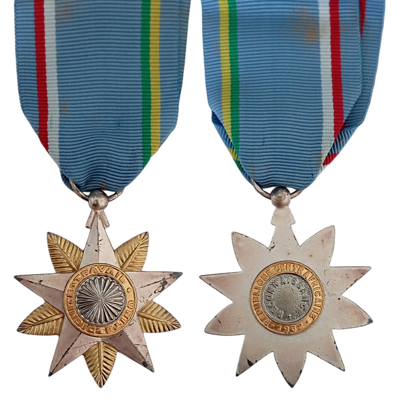 The Order of Gratitude: Officer's Cross, instituted in 1962. Breast Badge, 46x41 mm., gilt and silvered, original suspension ring and ribbon. I