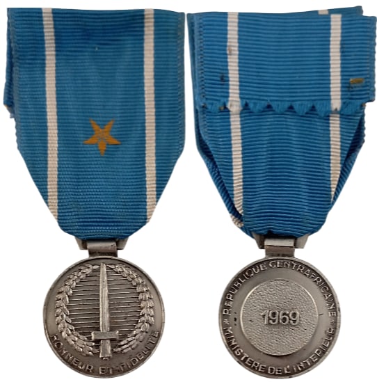 Ministry of Internal Affairs Medal, 1969: Breast Badge, 31x26 mm., silvered Bronze, original suspension ring and ribbon with gilt star. Mint state! I
