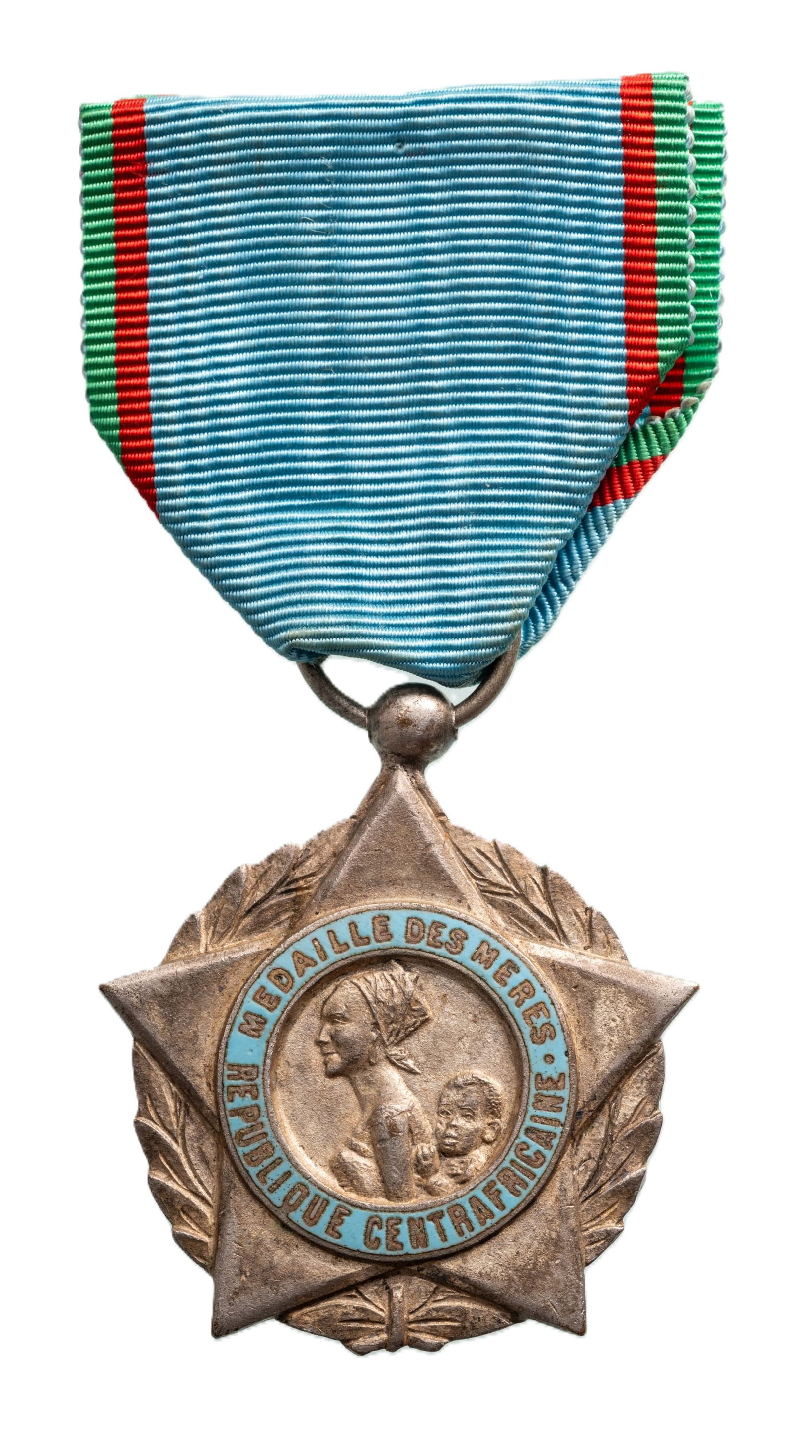 Medal of Honour for the Mothers: 3rd Class, for 7 Children, instituted in 1966. Breast Badge, 51x36 mm., silvered, one side enameled, original suspension ring and ribbon. Mint state! I
