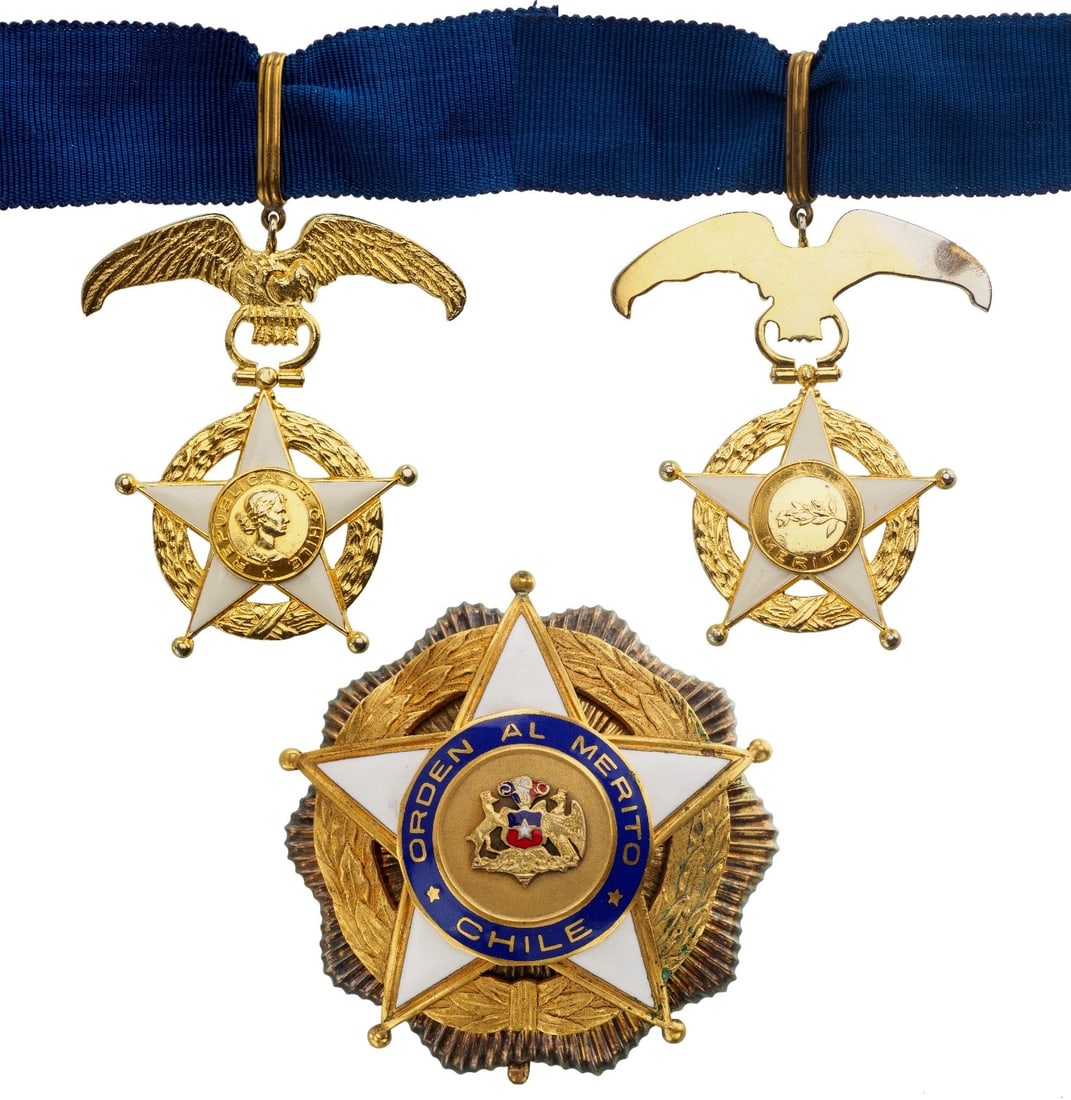 ORDER OF MERIT: Grand Officer's Set, instituted in 1929. Neck Badge, 73x48 mm., gilt Copper, enameled, original suspension device, ring, loop and ribbon. Breast Star, 81 mm, gilt Silver with smooth rays, superimposed