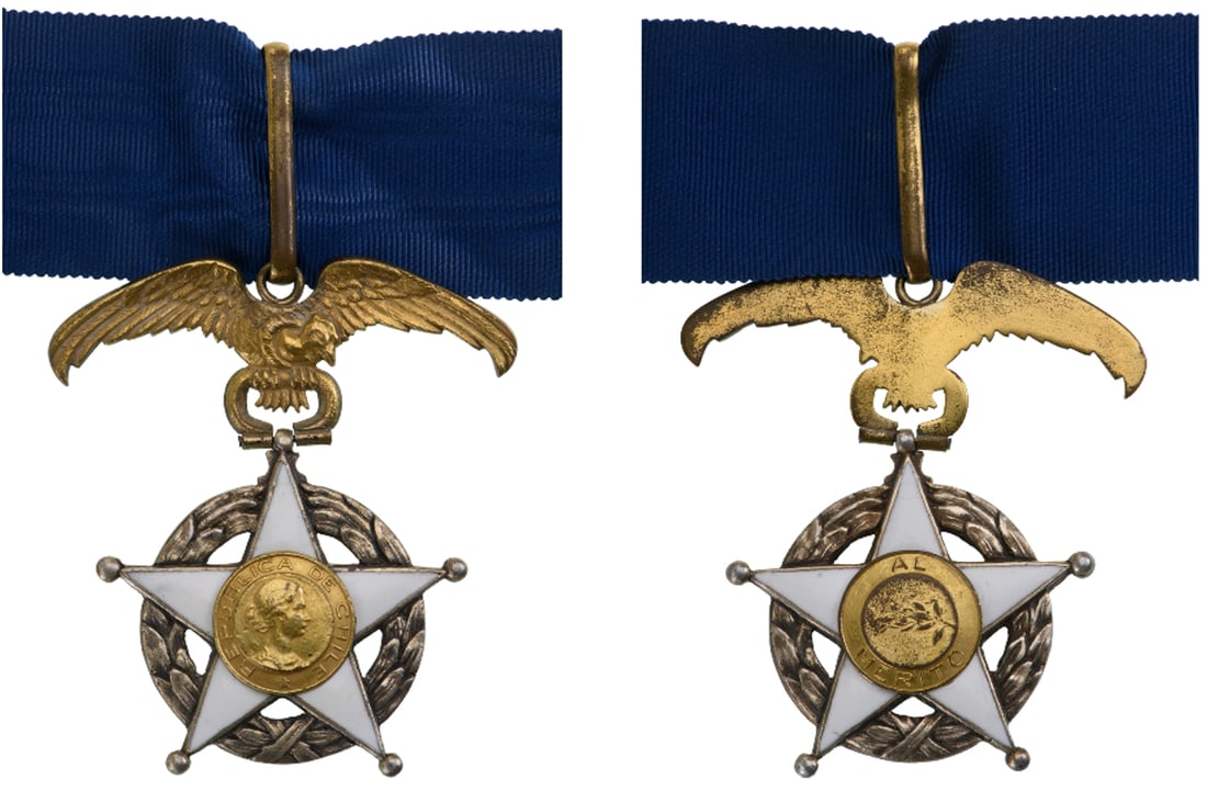 ORDER OF MERIT: Commander's Cross, instituted in 1929. Neck Badge, 68x61 mm., gilt Siver, enameled, original suspension device, ring and loop and ribbon. I
