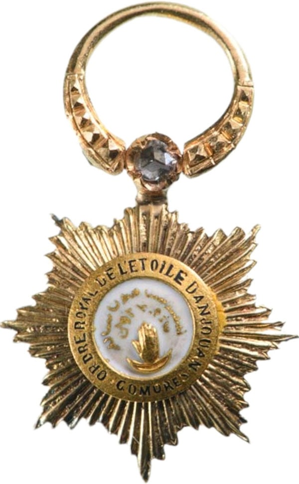 Order of the Star of Anjouan: Officer's Cross Miniature in Diamonds, 4th Class, instituted in 1874. Breast Badge, 16x13 mm., GOLD and one Brilliant, 1.5 g., enameled, central medallion gilt, enameled, original gilt suspension ring
