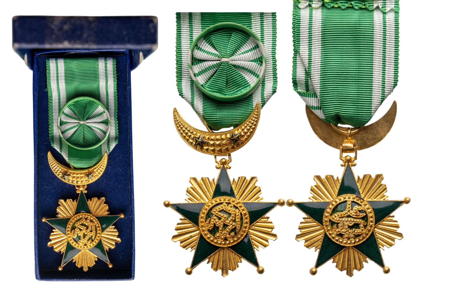 Order of the Star of Grand Comoros (SAID ALI): Officer's Cross, 4th Class. instituted in 1910. Breast Badge, 61x44 mm., gilt Bronze, enameled, original suspension crescent, ring and ribbon with rosette, in damaged case of issue. Mint state, superb