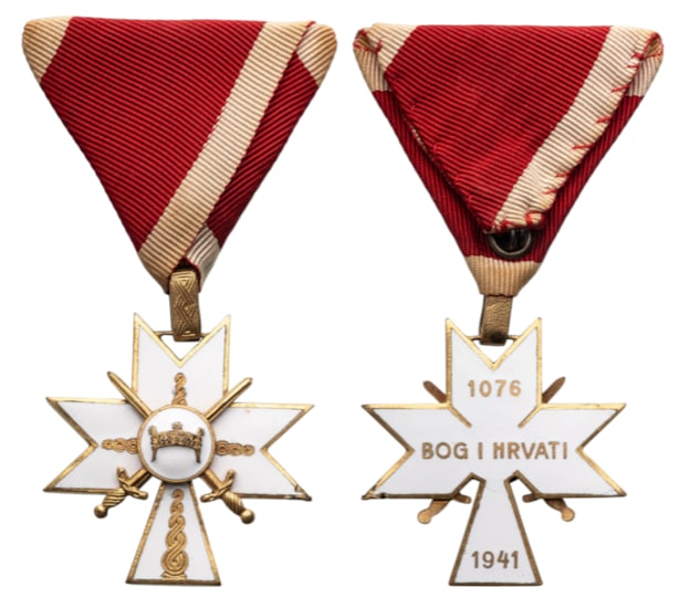 Order of the Crown of King Zvonimir: Knight's Cross, 5th Class Military, instituted in 1941. Breast Badge, 42 mm., gilt Silver, enameled, central medallion gilt, enameled, original gilt suspension loop and triangular ribbon. Very fine co